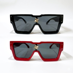 Image shows a pair of high-gloss black oversized square-frame sunglasses on the top and a matching pair in high-gloss red on the bottom, both featuring dark-tinted lenses and a central gold-finished starburst emblem.