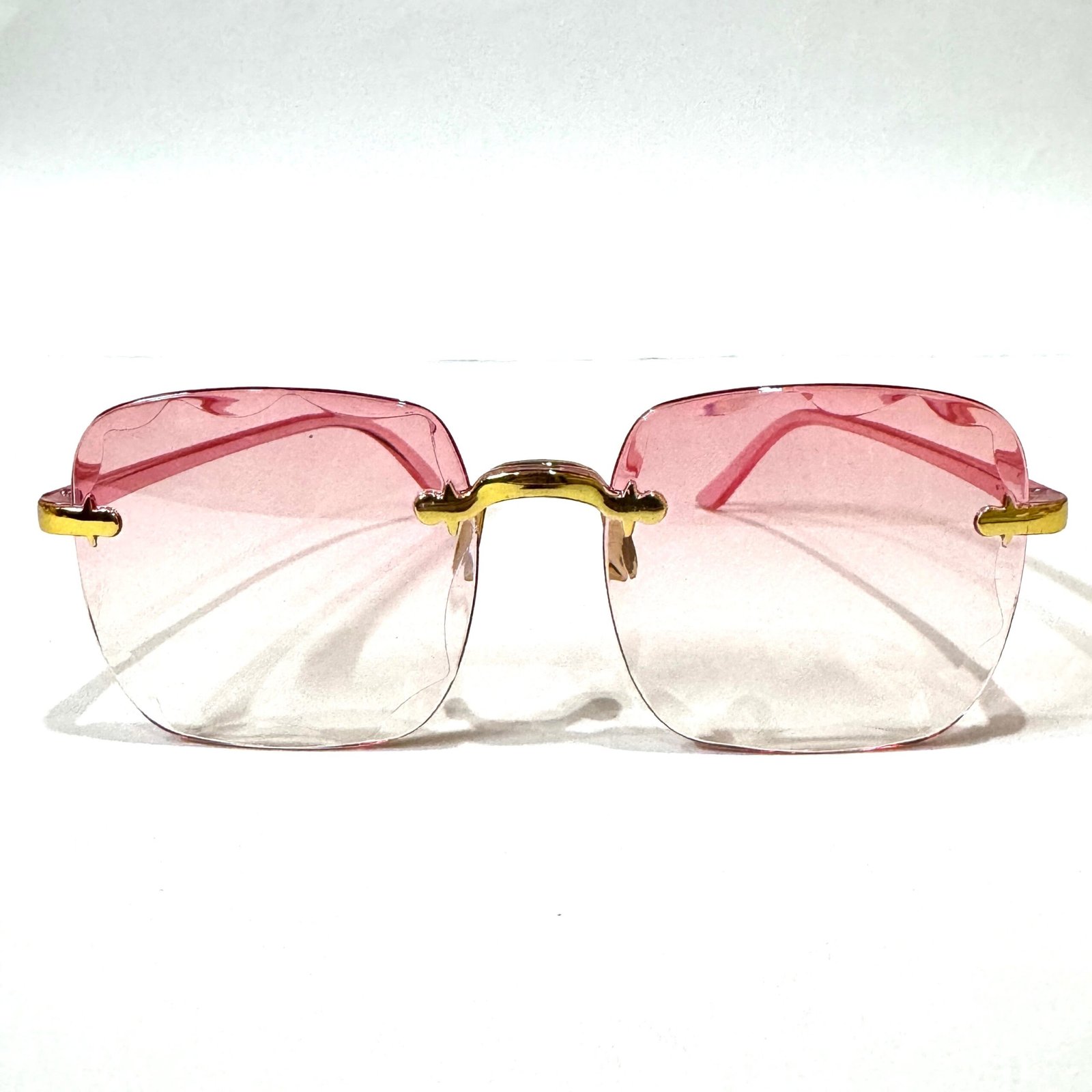 The Aurora Blush Rimless Sunglasses